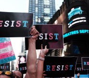 Dozens of protesters gather in Times Square near a military recruitment center to show their anger at President Donald Trump's decision to reinstate a ban on trans folk from serving in the militar. (Spencer Platt/Getty Images)