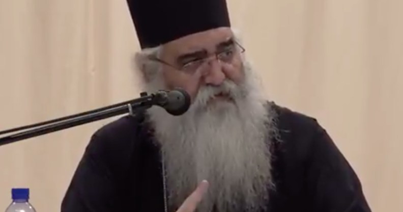 Bishop Neophytos of Morphou speaking into a microphone