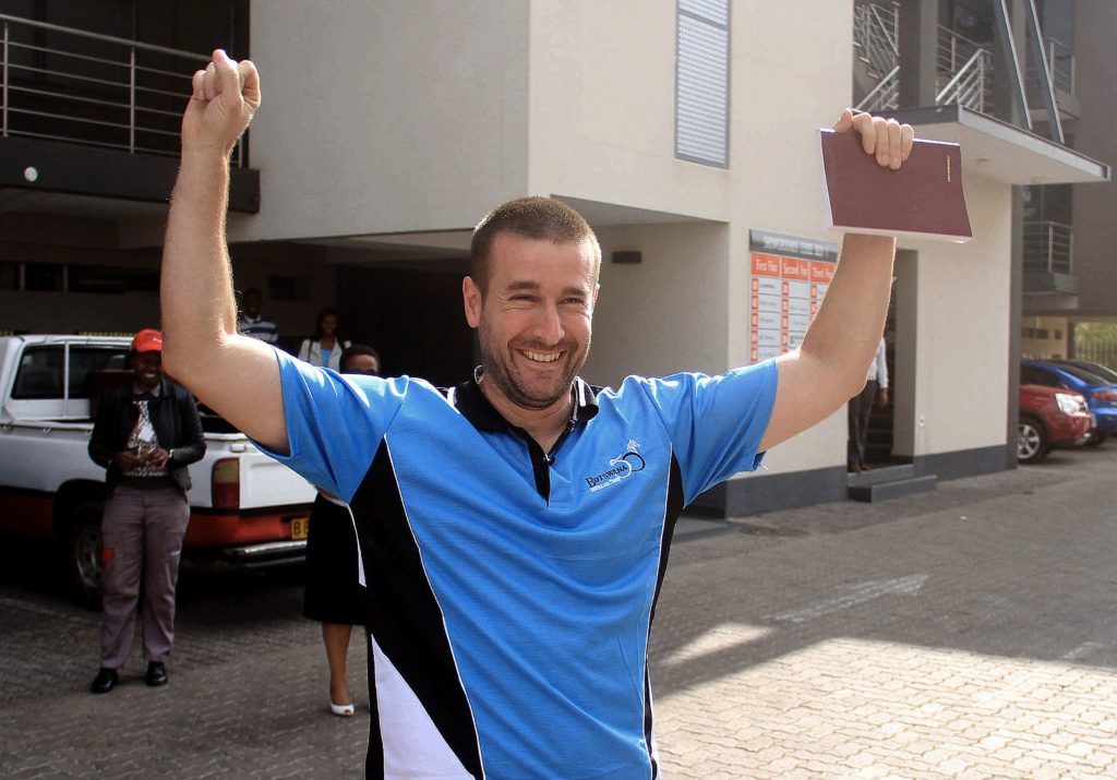 Controversial US pastor Steven Anderson reacts as he leaves the Botswana Department of immigration after being issued a deportation order by Botswana authorities, on September 20, 2016.