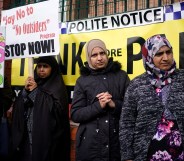 Parents, children and protesters demonstrate against the 'No Outsiders' programme, which teaches children about LGBT rights, at Parkfield Community School on March 21, 2019 in Birmingham, England.