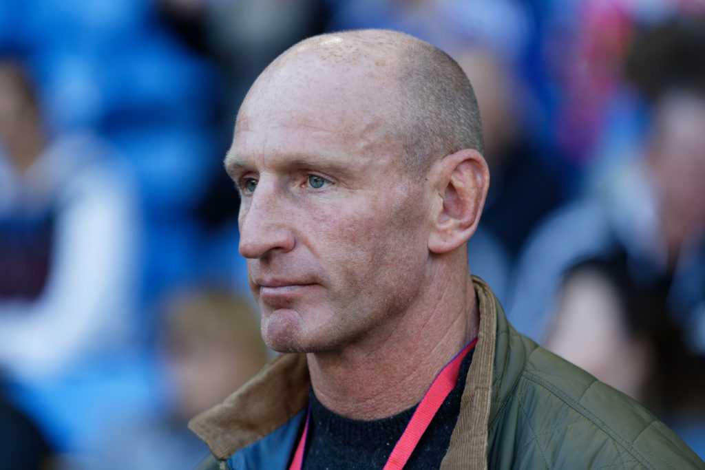 Former Wales international rugby player Gareth Thomas stands at the side of the pitch during the Premier League match between Cardiff City and Fulham FC at the Cardiff City Stadium on October 20, 2018 in Cardiff, Wales.