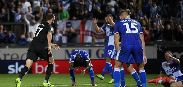 Bristol Rover players (right) on the pitch with Brighton & Hove Albion at Memorial Stadium, Bristol (Getty Images/Alex Davidson)