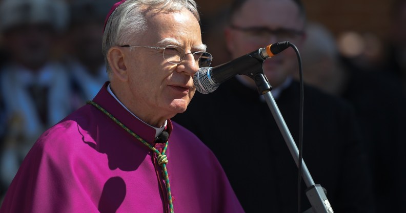 Archbishop of Krakow Marek Jedraszewski addresses the crowd outside Mariacki Basilica in Krakow ahead of the Easter food blessing on Holy Saturday.