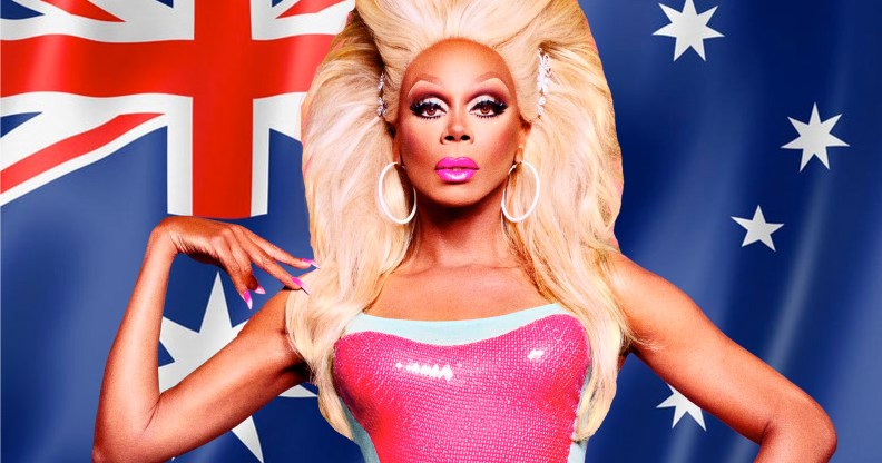 RuPaul in front of an Australian flag