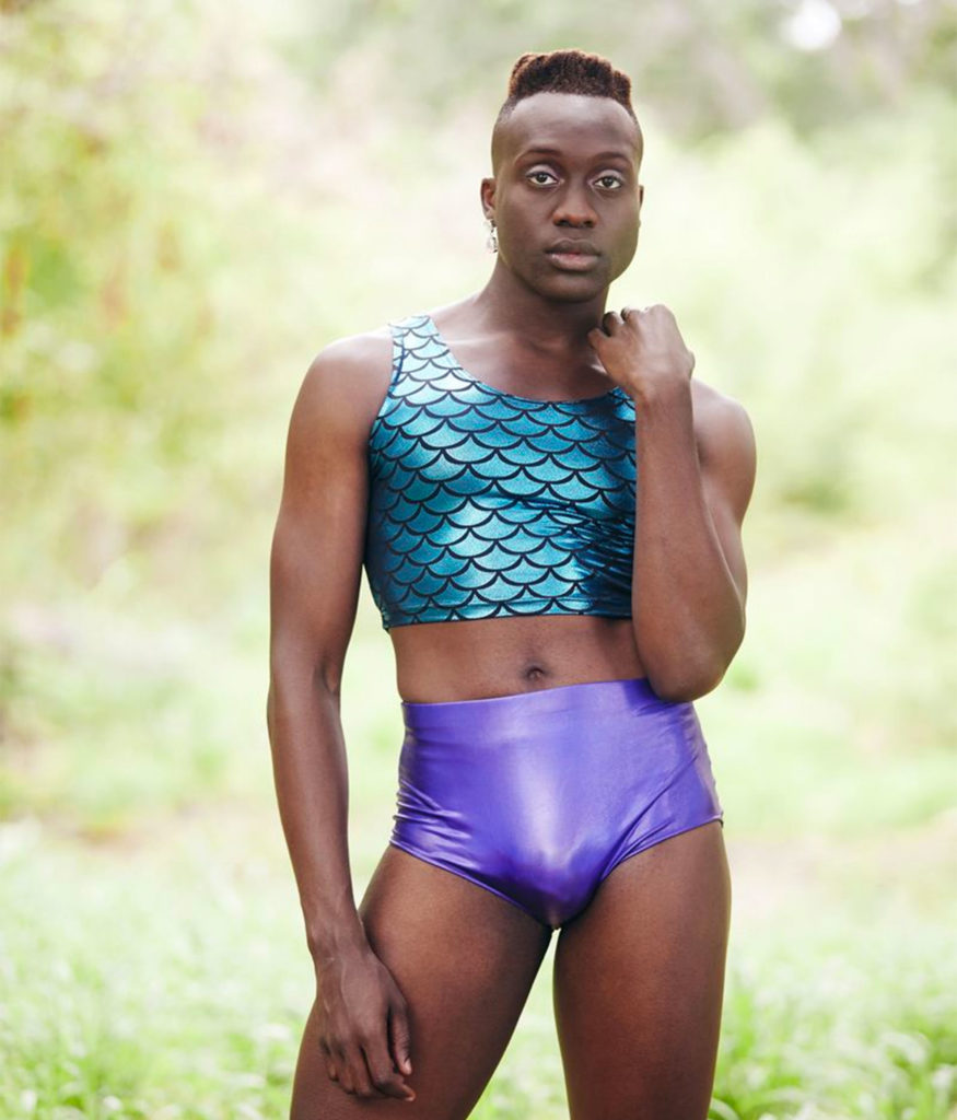 Basit Shittu in a mermaid print crop top and briefs