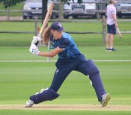 Maxine Blythin swinging a cricket bat