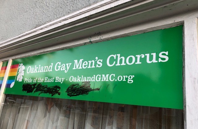 The Oakland Gay Men's Chorus group had their sign defaced