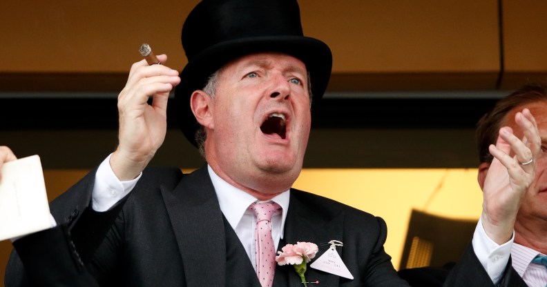 Piers Morgan smokes a cigar whilst watching the racing on day two of Royal Ascot at Ascot Racecourse on June 19, 2019 in Ascot, England.