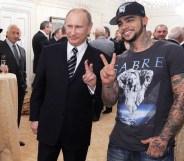 Vladimir Putin and Timati doing peace signs