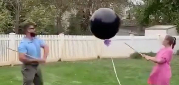 A couple's gender reveal party with a balloon went wrong in every conceivable way possible. (Screen capture via Twitter)