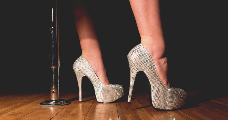 A woman wearing silver heels