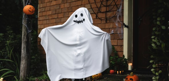 A queer person dressed up as the spirit that has possessed them. Spooky. (Stock photo via Elements Envato)