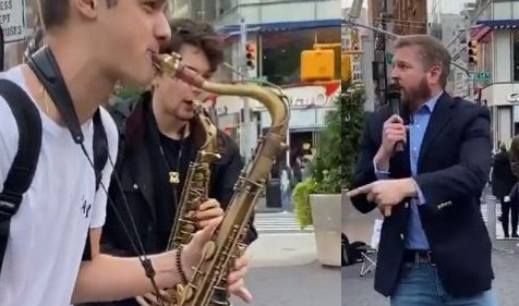 'Homophobic' hate preacher drowned out by street performers with saxophones