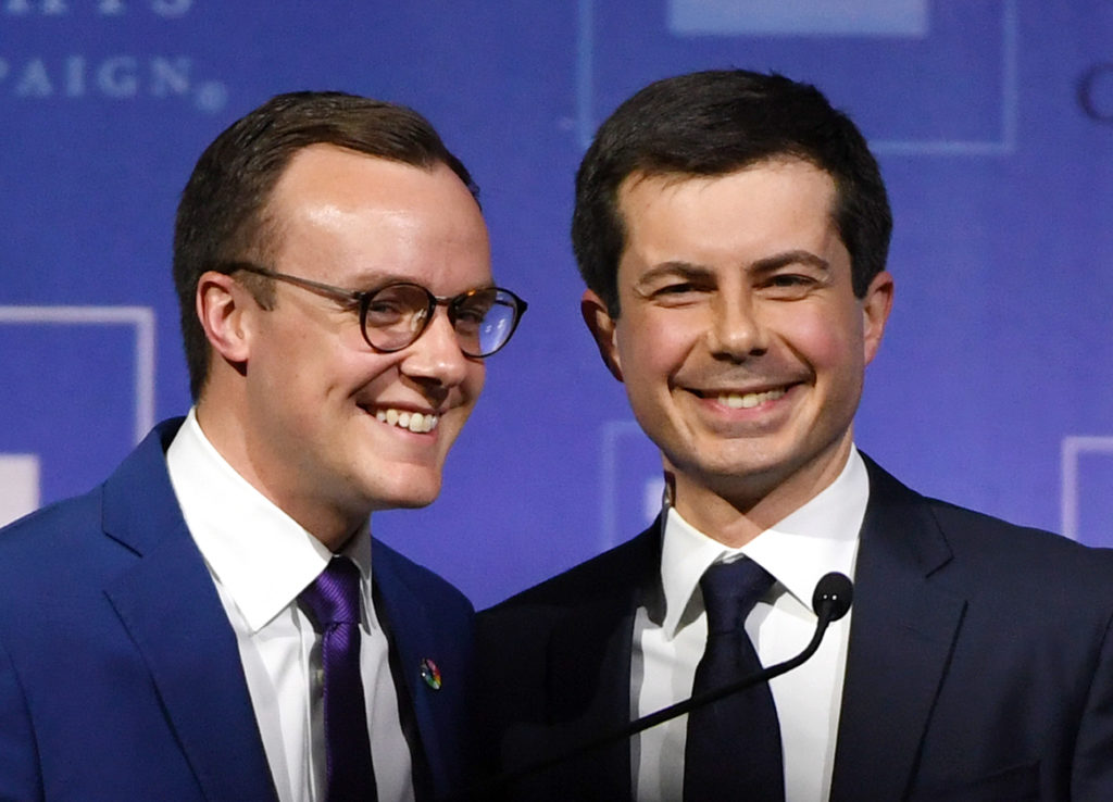 Chasten Glezman Buttigieg greets his husband, South Bend, Indiana Mayor Pete Buttigieg