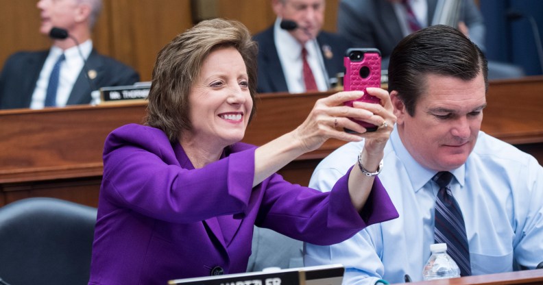 Rep. Vicky Hartzler, R-Mo., takes a picture during a House Armed Services Committee markup