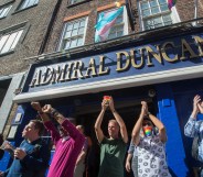 Customers at the Admiral Duncan applaud the 2019 Trans Pride parade.