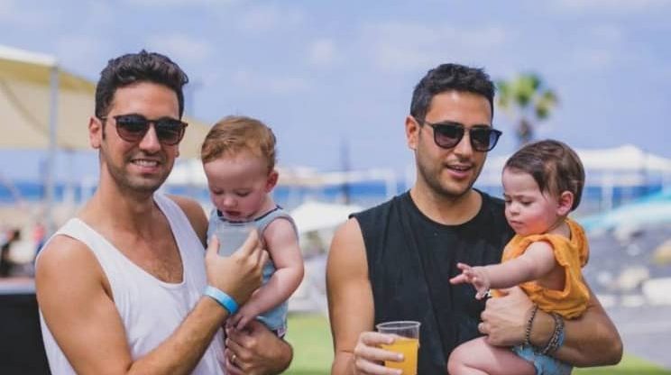 Gay dads told by government one must register as their child's mother as 'there is always one who is more dominant'