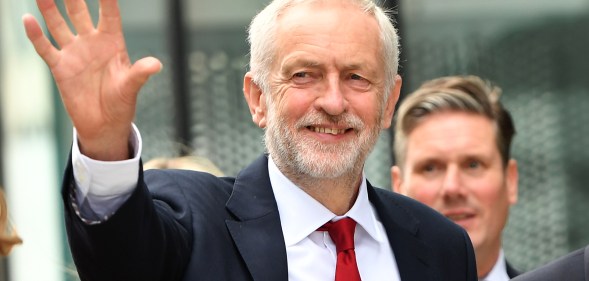 Labour Party leader Jeremy Corbyn waves as he arrives during the Labour Party conference on September 26, 2018. (Anthony Devlin/Getty Images)