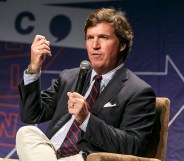 Tucker Carlson speaks onstage during Politicon 2018 at Los Angeles Convention Center on October 21, 2018 in Los Angeles, California.