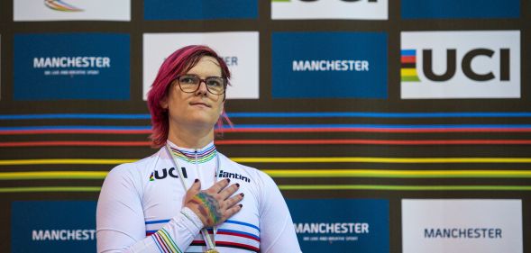 Canadian cyclist Rachel McKinnon celebrates her gold medal on the podium for the F35-39 Sprint discipline of the UCI Masters Track Cycling World Championships