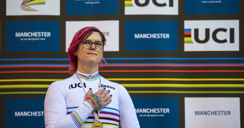 Canadian cyclist Rachel McKinnon celebrates her gold medal on the podium for the F35-39 Sprint discipline of the UCI Masters Track Cycling World Championships