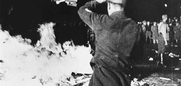 Nazis burn LGBT+ and Jewish works at the Institute of Sex Research in Berlin in 1933