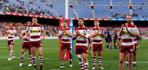 Wigan Warriors players acknowledge their fans at the end of the Betfred Super League between Cataland Dragons and Wigan Warriors match at Camp Nou on May 18, 2019