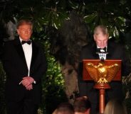 Franklin Graham gives a blessing next to US President Donald Trump at the White House