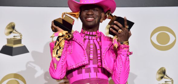 Lil Nas X wins big at the Grammys in all-pink Versace dominatrix outfit