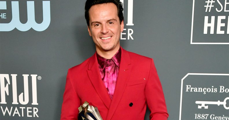 Andrew Scott in a red suit with a fuschia shirt