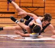 A priest was caught taking photos in a high school gym during a wrestling tournament without consent or knowledge. (Stock photo via UnSplash)