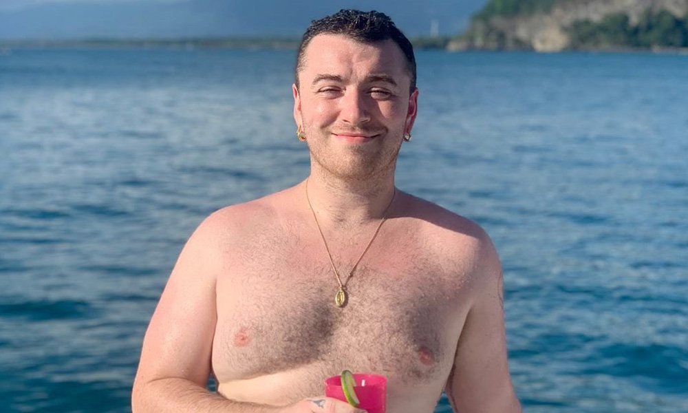 Sam Smith topless on a boat