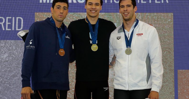 Markus Thormeyer (C) of Canada poses with his gold medal. (Kevin C. Cox/Getty Images)