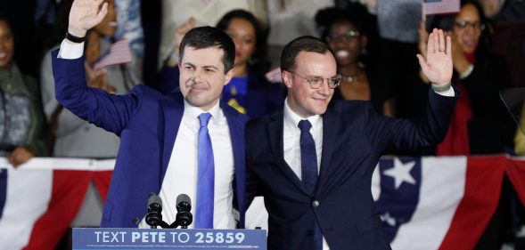 Democratic presidential candidate Pete Buttigieg waves with his husband Chasten Buttigieg after addressing supporters at his caucus night watch party on February 03, 2020 in Des Moines, Iowa. (Tom Brenner/Getty Images)