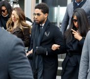 Flanked by attorneys and supporters, actor Jussie Smollett walks out of the Leighton Criminal Courthouse after pleading not guilty to a new indictment on February 24, 2020 in Chicago, Illinois.