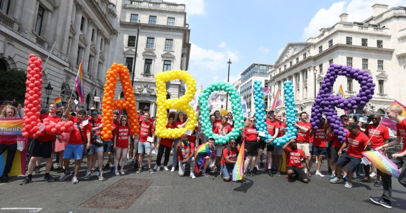 Labour party members walk the parade during Pride In London on July 7, 2018