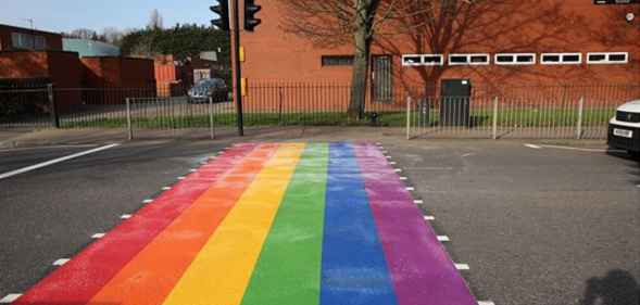 The LGBT+ Pride flag crossing outside Woodside High School attracted hundreds of online complaints. (Woodside High School/Instagram)