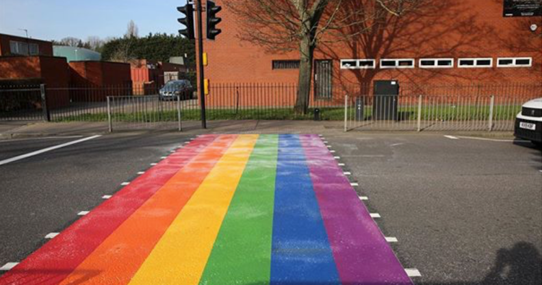 The LGBT+ Pride flag crossing outside Woodside High School attracted hundreds of online complaints. (Woodside High School/Instagram)