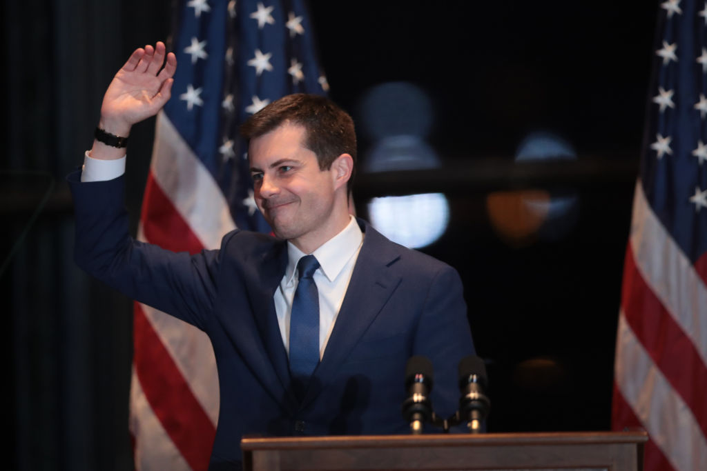 Pete Buttigieg with his husband Chasten in South Bend, Indiana, where he announced he was dropping out of the presidential race