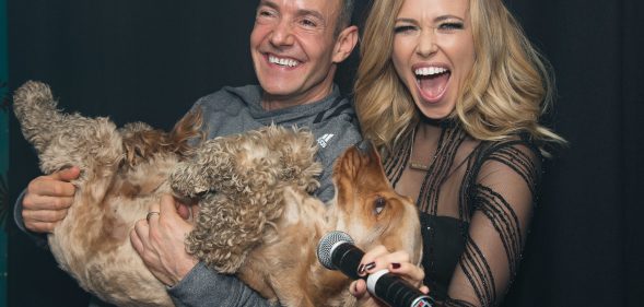 Rachel Platten (R) poses backstage with Jeremy Joseph and Jacob the dog before her performance on stage at G-A-Y Club Night at Heaven. (Jo Hale/Redferns)