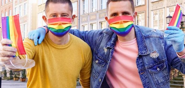 Poland: Couple fight COVID-19 and LGBT-free zones with rainbow masks