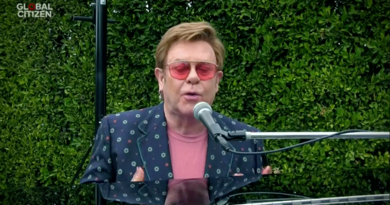 Elton John playing piano