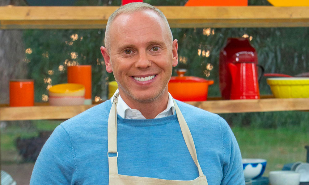 Judge Rinder in a Bake Off apron