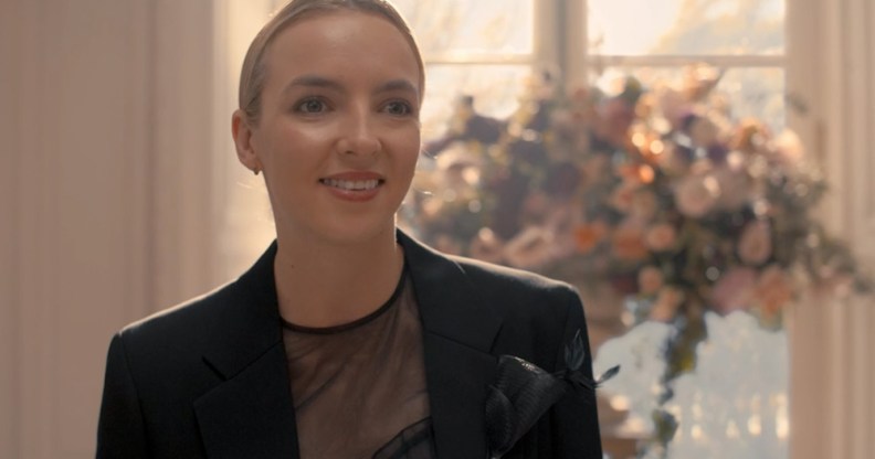 Villanelle in a black wedding suit