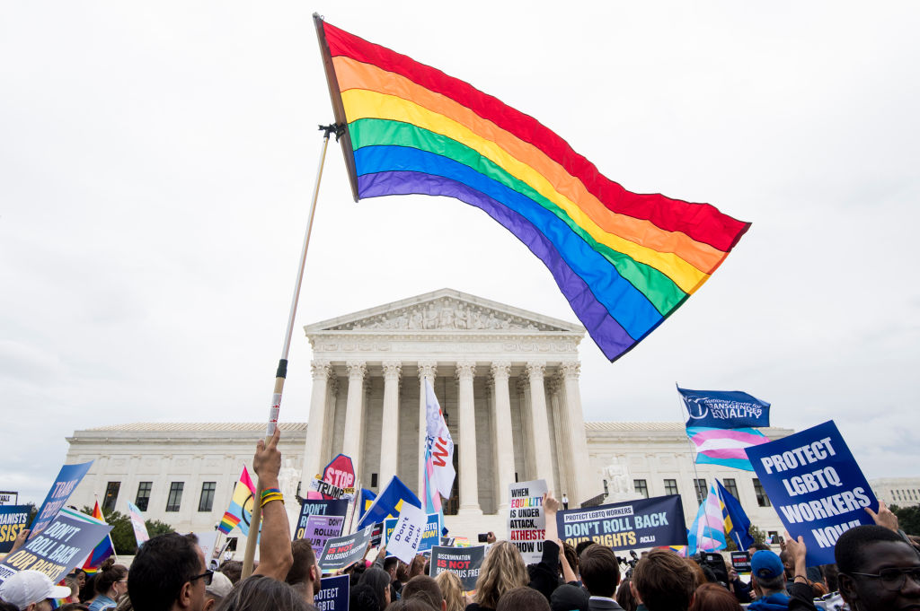 LGBT+ activists rally in front of the Supreme Court in October 2019