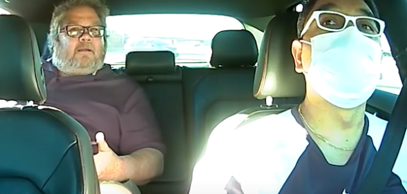 Alarming video footage shows the moment a homophobic and racist passenger scorned his Lyft driver after being asked to wear a mask. (Screen capture via YouTube)
