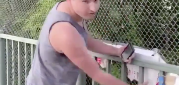 Man rips up black lives matter signs