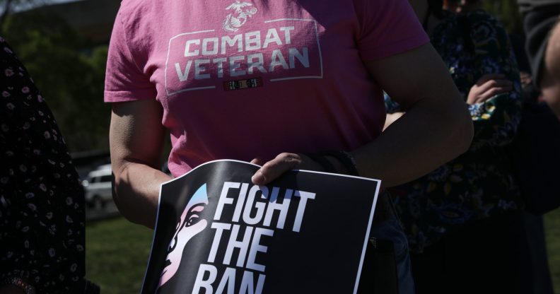 Democratic lawmakers joined activists to rally against the transgender military service ban.