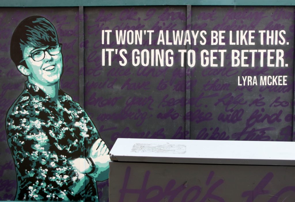 A painted mural featuring murdered journalist Lyra McKee