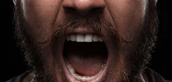 Close-up portrait of angry man